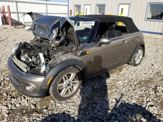 2011 MINI Convertible z VIN WMWZN3C58BT265118, wystawiony jako Copart lot #76495324 z przebiegiem Nie podano mil oraz Nie do naprawy • Non repairable. Historia ofert i sprzedaży dostępna na DreamBid. Obrazek 1.