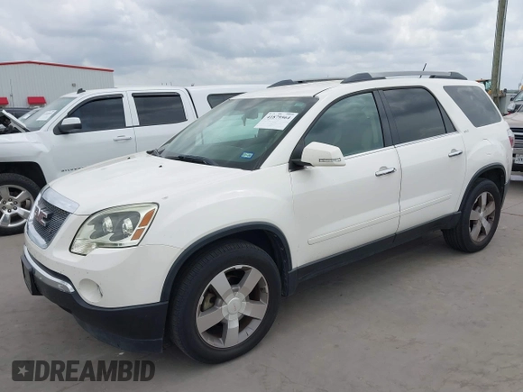 2011 GMC Acadia SLT1 with VIN 1GKKVRED3BJ144346, listed as a IAAI auction lot 41879564 with 311,658 mi miles and . Bid and sale history available at DreamBid. Image 2.