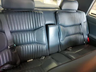 1995 Buick Park Avenue Ultra with VIN 1G4CU5211SH661573, listed as a Copart auction lot 66585644 with 177,755 mi miles and Salvage Title. Bid and sale history available at carsss.com. Image 10.