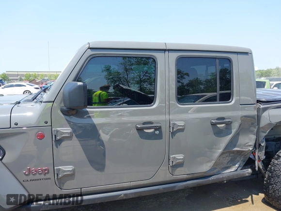 2021 Jeep Gladiator Rubicon with VIN 1C6JJTBG2ML515932, listed as a IAAI auction lot 42471704 with 57,775 mi miles and . Bid and sale history available at DreamBid. Image 15.