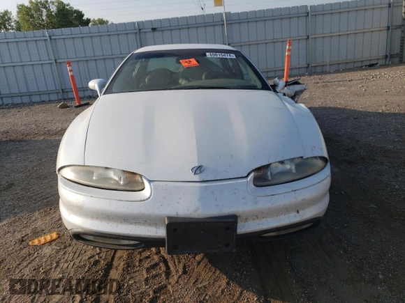 1997 Oldsmobile Aurora z VIN 1G3GR62CXV4124968, wystawiony jako Copart lot #69615474 z przebiegiem 249 895 mil mil oraz Nie do naprawy. Historia ofert i sprzedaży dostępna na DreamBid. Obrazek 5.
