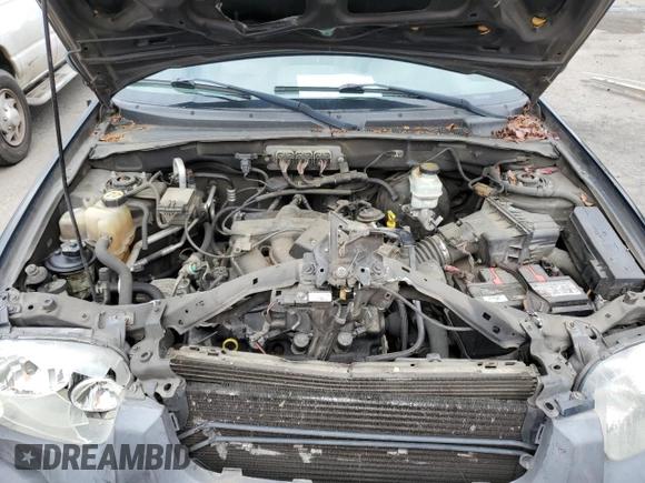 2006 Ford Escape XLT z VIN 1FMCU03146KB47131, wystawiony jako Copart lot #56731215 z przebiegiem 230 520 mil mil oraz Szkoda całkowita • Salvage title. Historia ofert i sprzedaży dostępna na DreamBid. Obrazek 12.