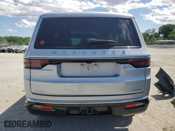 2023 Jeep Wagoneer Series II Carbide with VIN 1C4SJVBP1PS561660, listed as a Copart auction lot 57832565 with 17,715 mi miles and Salvage title. Bid and sale history available at DreamBid. Image 6.