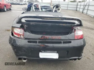1999 Porsche 911 z VIN WP0CA2990XS651649, wystawiony jako Copart lot #45002045 z przebiegiem Nie podano mil oraz Szkoda całkowita • Salvage title. Historia ofert i sprzedaży dostępna na DreamBid. Obrazek 6.