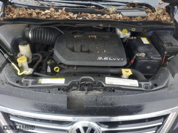 2012 Volkswagen Routan SE with VIN 2C4RVABG9CR293464, listed as a Copart auction lot 74490304 with 98,681 mi miles and Clean Title. Bid and sale history available at carsss.com. Image 12.