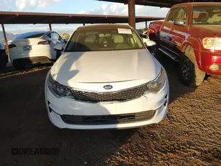 2016 Kia Optima EX with VIN 5XXGU4L30GG117411, listed as a IAAI auction lot 42034988 with 123,387 mi miles. Bid and sale history available at carsss.com. Image 12.