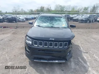 2018 Jeep Compass Limited with VIN 3C4NJDCB7JT332674, listed as a IAAI auction lot 42145567 with 111,852 mi miles and . Bid and sale history available at carsss.com. Image 12.