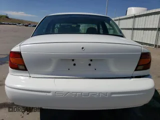 2002 Saturn SL z VIN 1G8ZH52882Z253088, wystawiony jako Copart lot #55062225 z przebiegiem 177 866 mil mil oraz Szkoda całkowita • Salvage title. Historia ofert i sprzedaży dostępna na DreamBid. Obrazek 6.