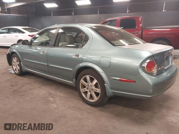 2002 Nissan Maxima GLE z VIN JN1DA31A12T308581, wystawiony jako IAAI lot #41742949 z przebiegiem 116 892 mil mil oraz . Historia ofert i sprzedaży dostępna na DreamBid. Obrazek 3.