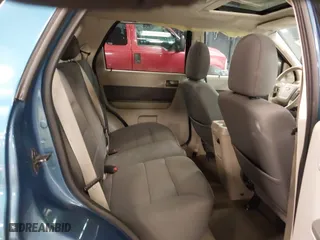2009 Ford Escape XLT with VIN 1FMCU93G99KB70918, listed as a IAAI auction lot 41942399 with 141,158 mi miles. Bid and sale history available at carsss.com. Image 8.