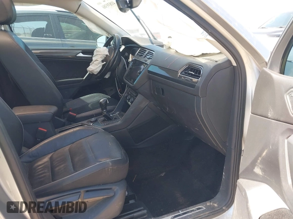2019 Volkswagen Tiguan SEL Premium with VIN 3VV4B7AX5KM085435, listed as a IAAI auction lot 41839386 with 124,501 mi miles and . Bid and sale history available at DreamBid. Image 5.