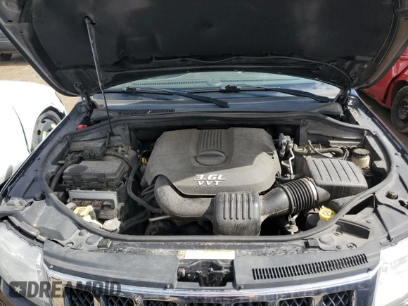 2013 Jeep Grand Cherokee Overland with VIN 1C4RJFCG4DC586089, listed as a Copart auction lot 50768105 with 98,862 mi miles and Non Repairable. Bid and sale history available at carsss.com. Image 12.