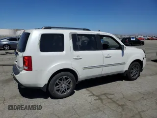 2013 Honda Pilot Touring with VIN 5FNYF4H95DB016049, listed as a Copart auction lot 61012725 with 104,252 mi miles and Salvage title. Bid and sale history available at DreamBid. Image 3.