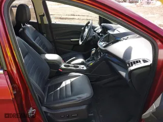 2016 Ford Escape Titanium with VIN 1FMCU9J9XGUC71696, listed as a IAAI auction lot 41651168 with 108,856 mi miles. Bid and sale history available at carsss.com. Image 5.
