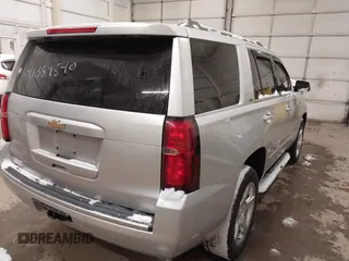 2016 Chevrolet Tahoe LTZ z VIN 1GNSKCKCXGR284827, wystawiony jako IAAI lot #41389540 z przebiegiem 93 150 mil mil oraz . Historia ofert i sprzedaży dostępna na DreamBid. Obrazek 4.