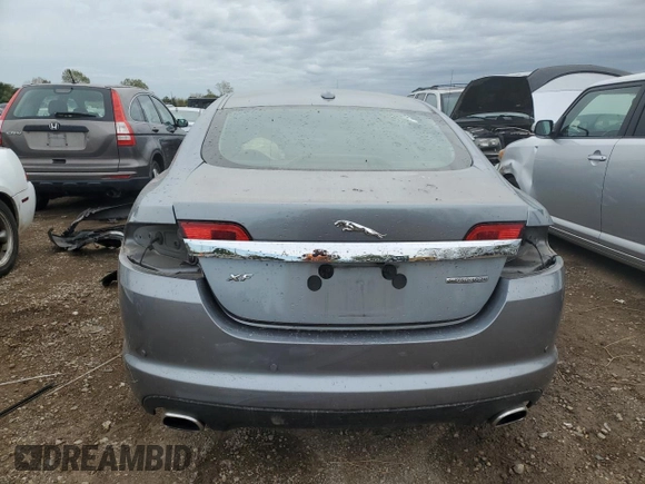 2009 Jaguar XF with VIN SAJWA07C991R41110, listed as a Copart auction lot 73204964 with 147,727 mi miles and Salvage Title. Bid and sale history available at DreamBid. Image 6.