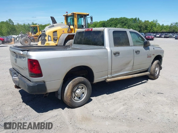 2014 Ram 2500 Tradesman z VIN 3C6TR5CT7EG186099, wystawiony jako IAAI lot #42317585 z przebiegiem 309 687 mil mil oraz . Historia ofert i sprzedaży dostępna na DreamBid. Obrazek 4.