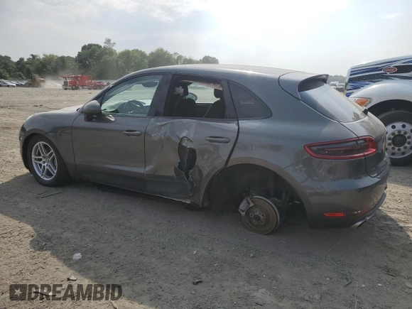 2015 Porsche Macan S with VIN WP1AB2A50FLB69249, listed as a Copart auction lot 60865995 with 128,659 mi miles and Salvage title. Bid and sale history available at DreamBid. Image 2.
