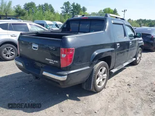 2010 Honda Ridgeline RTL z VIN 5FPYK1F56AB003730, wystawiony jako IAAI lot #42255351 z przebiegiem 190 630 mil mil oraz . Historia ofert i sprzedaży dostępna na DreamBid. Obrazek 4.