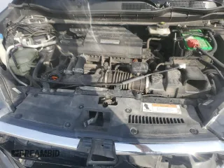 2018 Honda CR-V Touring z VIN 7FARW2H94JE077885, wystawiony jako Copart lot #55451345 z przebiegiem 133 964 mil mil oraz Szkoda całkowita • Salvage title. Historia ofert i sprzedaży dostępna na DreamBid. Obrazek 11.