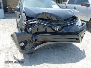 2018 Toyota RAV4 XLE z VIN 2T3WFREVXJW491725, wystawiony jako IAAI lot #42216365 z przebiegiem 76 365 mil mil oraz . Historia ofert i sprzedaży dostępna na DreamBid. Obrazek 6.