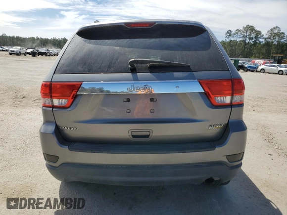 2012 Jeep Grand Cherokee Laredo with VIN 1C4RJEAG7CC281701, listed as a Copart auction lot 47366415 with 193,477 mi miles and Salvage Title. Bid and sale history available at carsss.com. Image 6.