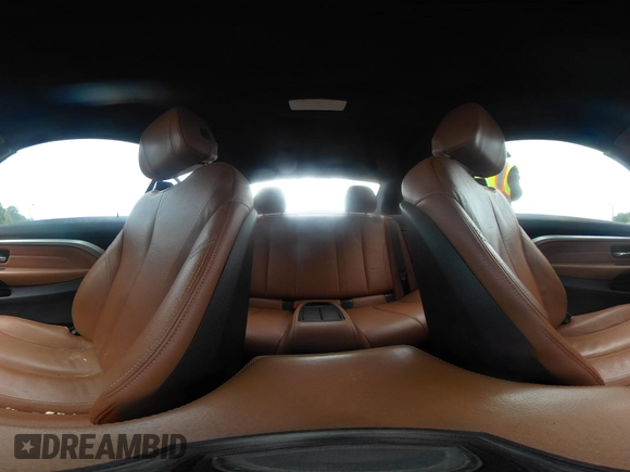 2014 BMW 4 Series 435i with VIN WBA3T3C50EJ876997, listed as a IAAI auction lot 42406299 with 115,048 mi miles and . Bid and sale history available at DreamBid. Image 18.