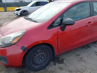 2013 Kia Rio LX with VIN KNADM4A38D6110543, listed as a IAAI auction lot 42068435 with 163,523 mi miles. Bid and sale history available at carsss.com. Image 6.