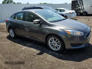 2016 Ford Focus SE with VIN 1FADP3F29GL373589, listed as a Copart auction lot 62149405 with 38,430 mi miles and Clean title. Bid and sale history available at DreamBid. Image 4.