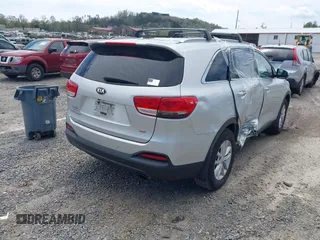 2016 Kia Sorento LX with VIN 5XYPG4A35GG048897, listed as a IAAI auction lot 41986578 with 161,157 mi miles. Bid and sale history available at carsss.com. Image 4.