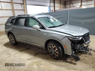 2023 Cadillac XT6 AWD Sport with VIN 1GYKPGRS5PZ121334, listed as a Copart auction lot 50606324 with 10,455 mi miles and Salvage Title. Bid and sale history available at carsss.com. Image 4.