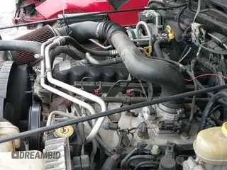 2004 Jeep Wrangler Sport z VIN 1J4FA49S34P706826, wystawiony jako IAAI lot #43262761 z przebiegiem 99 901 mil mil oraz . Historia ofert i sprzedaży dostępna na DreamBid. Obrazek 18.