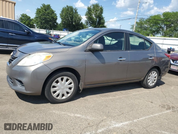 2012 Nissan Versa SV with VIN 3N1CN7AP7CL930619, listed as a Copart auction lot 63657855 with 106,911 mi miles and Salvage title. Bid and sale history available at DreamBid. Image 1.