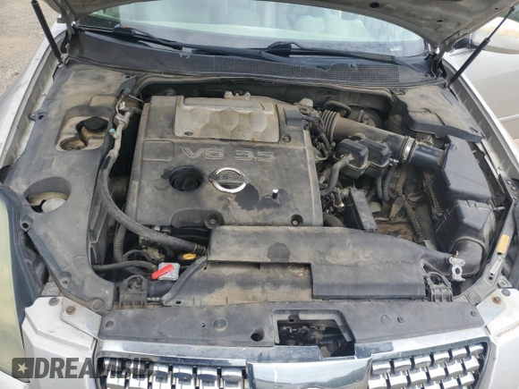 2004 Nissan Maxima SL with VIN 1N4BA41EX4C869772, listed as a Copart auction lot 69843554 with 205,409 mi miles and Salvage Title. Bid and sale history available at carsss.com. Image 12.