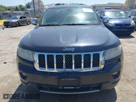 2013 Jeep Grand Cherokee Overland with VIN 1C4RJECT8DC534021, listed as a IAAI auction lot 42058374 with 137,289 mi miles. Bid and sale history available at carsss.com. Image 12.
