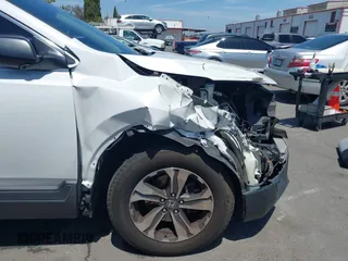 2019 Honda CR-V LX with VIN 2HKRW5H33KH407463, listed as a IAAI auction lot 42034584 with 85,454 mi miles and . Bid and sale history available at DreamBid. Image 6.