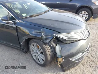 2013 Lincoln MKZ with VIN 3LN6L2J95DR804855, listed as a IAAI auction lot 41264935 with 115,226 mi miles. Bid and sale history available at carsss.com. Image 6.