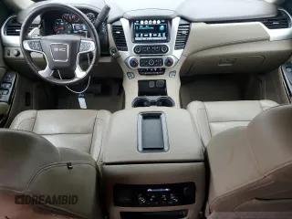 2020 GMC Yukon SLT with VIN 1GKS1BKC3LR168874, listed as a Copart auction lot 82103464 with 79,220 mi miles and Salvage Title. Bid and sale history available at DreamBid. Image 8.