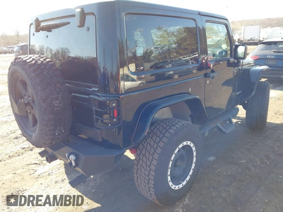 2011 Jeep Wrangler Rubicon with VIN 1J4HA6D14BL508098, listed as a IAAI auction lot 41423284 with 49,840 mi miles and . Bid and sale history available at carsss.com. Image 4.