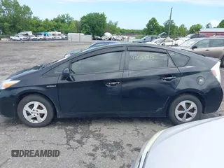 2012 Toyota Prius One with VIN JTDKN3DUXC1610785, listed as a IAAI auction lot 42651718 with 212,689 mi miles and . Bid and sale history available at DreamBid. Image 14.