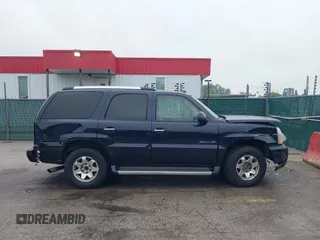 2005 Cadillac Escalade z VIN 1GYEK63N95R124940, wystawiony jako IAAI lot #42255300 z przebiegiem 160 355 mil mil oraz . Historia ofert i sprzedaży dostępna na DreamBid. Obrazek 13.