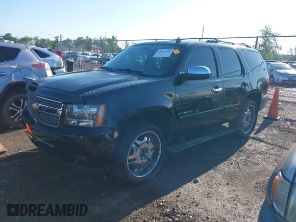 2008 Chevrolet Tahoe LTZ with VIN 1GNFK13018R259715, listed as a IAAI auction lot 42642469 with 208,452 mi miles and . Bid and sale history available at DreamBid. Image 2.