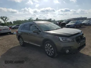 2019 Subaru Outback Touring with VIN 4S4BSATC9K3310028, listed as a Copart auction lot 56922665 with 218,155 mi miles and Salvage title. Bid and sale history available at DreamBid. Image 4.