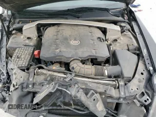 2012 Cadillac CTS z VIN 1G6DA5E54C0100982, wystawiony jako Copart lot #51357945 z przebiegiem 100 798 mil mil oraz Szkoda całkowita • Salvage title. Historia ofert i sprzedaży dostępna na DreamBid. Obrazek 13.