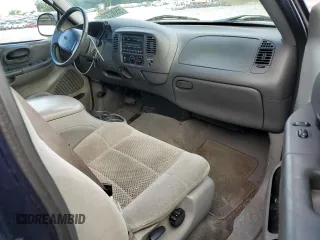 2002 Ford F-150 XL with VIN 1FTRX17232NB20820, listed as a Copart auction lot 55062355 with 231,726 mi miles and Salvage title. Bid and sale history available at DreamBid. Image 8.
