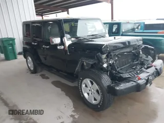 2007 Jeep Wrangler Unlimited Sahara with VIN 1J4GB591X7L227636, listed as a IAAI auction lot 41903987 with 239,179 mi miles and . Bid and sale history available at DreamBid. Image 1.