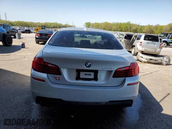 2014 BMW 5 Series 528i with VIN WBA5A5C54ED509285, listed as a Copart auction lot 52080765 with 104,802 mi miles and Salvage Title. Bid and sale history available at carsss.com. Image 6.