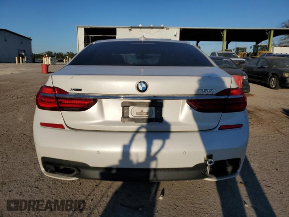 2016 BMW 7 Series 750i xDrive with VIN WBA7B0C59GG526741, listed as a Copart auction lot 86312384 with 90,360 mi miles and Salvage title. Bid and sale history available at DreamBid. Image 6.