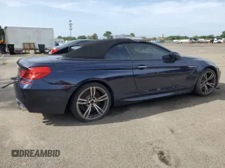 2015 BMW M6 z VIN WBSLZ9C59FD651474, wystawiony jako Copart lot #60882454 z przebiegiem Nie podano mil oraz Szkody całkowita. Historia ofert i sprzedaży dostępna na DreamBid. Obrazek 3.