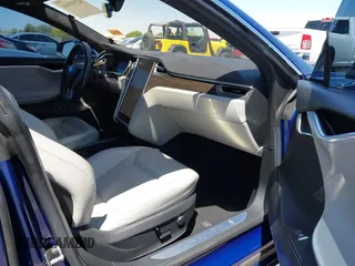 2016 Tesla Model S 70 kWh Battery with VIN 5YJSA1E10GF126433, listed as a IAAI auction lot 42169558 with 120,182 mi miles and . Bid and sale history available at carsss.com. Image 5.